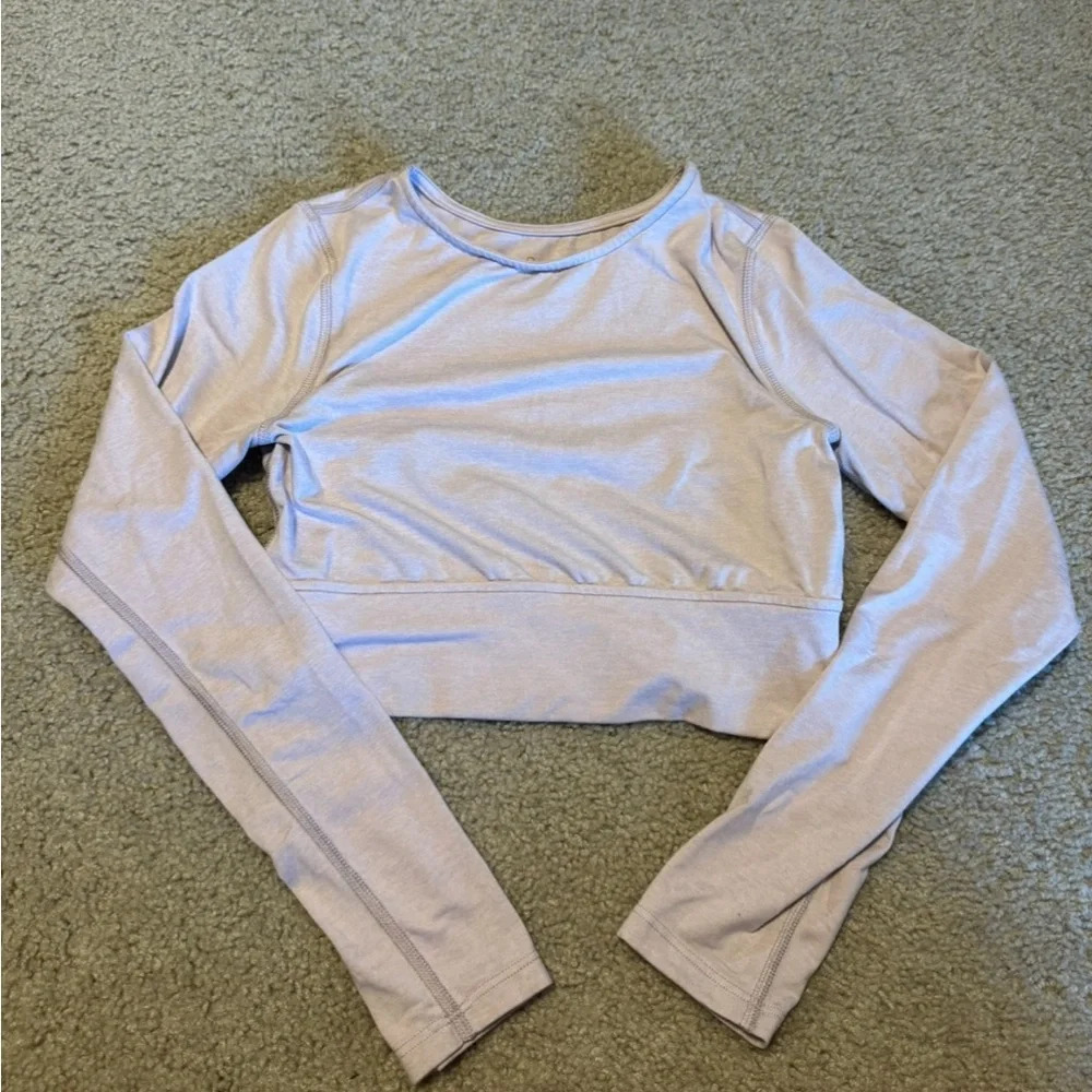 Pink isla movement open back long sleeve crop‎